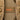 Tan backpack panel with mesh backing and 'GEAR UP' patch