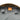 Backpack interior close-up with orange 'PENTAGON' label on gray lining