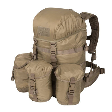 Coyote 35L tactical backpack with front flap and webbing buckles on side pockets.