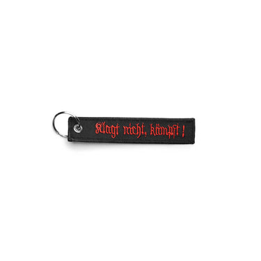 Black embroidered key ring with red text patch and metal ring