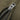 Metal zipper pull and teeth on a tan jacket