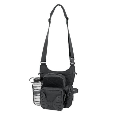 Helikon EDC side bag in black with front zip pocket, bottle pouch, and adjustable straps