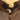 Brown leather bomber jacket close-up of shearling-lined collar and metal zipper