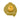 Gold-tone backing of jacket-shaped pin with pin post and @cockpitusa mark