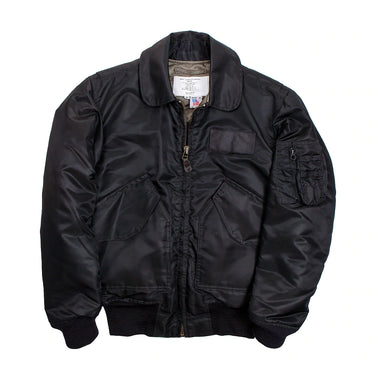 Black pilots jacket with zip front, stand collar, chest pockets, and rib-knit cuffs