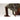 Engraved metal revolver trigger and guard detail with wooden grip