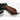 Denix pistol replica close-up of brown wooden grip with black trigger area