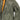 Sage green MA-1 bomber jacket detail with side zip pocket and orange-trim lining