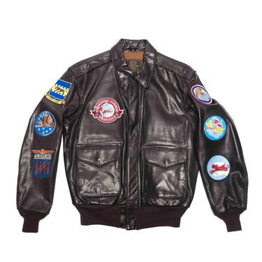 Brown goatskin bomber jacket with front zip and colorful sleeve patches
