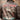 Brown leather A-2 jacket with large back graphic reading 'Remember Pearl Harbor'