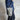 Salt-and-pepper canvas bike bag with snap pocket and adjustable strap, stamped 40968