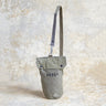 Salt-and-pepper canvas bike bag with long strap and top loop, snap closure, stamped 40854