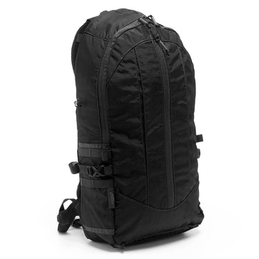 Nylon backpack in black with front pocket and adjustable webbing straps