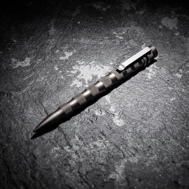 Tactical defender pen, gun metal with knurled grip and pointed tip