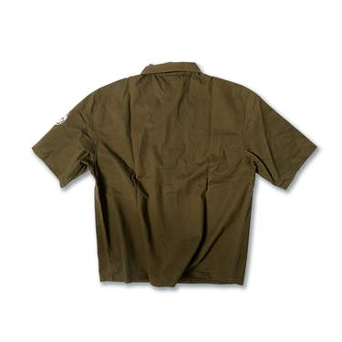 Olive drab utility overshirt back view with short sleeves and visible panel seams.