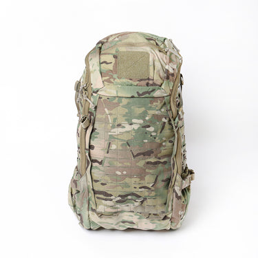 Tactical backpack in camouflage with front panel pockets and webbing straps