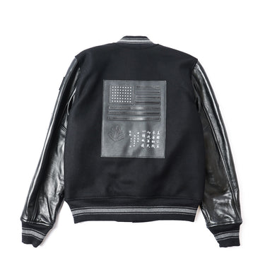Black back varsity leather jacket with large embossed square patch