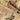 Multicam tactical jacket front zipper with tan zipper pull and protective fabric tape