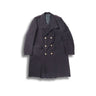 Dark navy long wool coat, double-breasted with gold buttons and flap pockets.