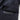 Dark navy coat side pocket close-up with leather-look trim and stitching.