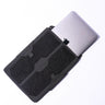 Black padded laptop sleeve with hook-and-loop front panel, laptop partially inserted.