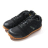 Black barefoot activity shoes with lace-up upper and green gum outsole