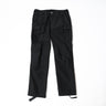 Black BDU-style cargo pants with belt loops, button closure, and multiple flap pockets.