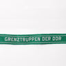 Green ribbon badge with white text "GRENZTRUPPEN DER DDR"