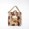 Desert camo helmet bag with tiger logo, top handles, and carry strap
