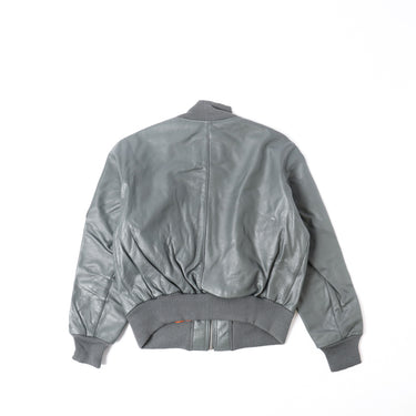 Grey flight leather jacket back view with ribbed hem and waistband trim