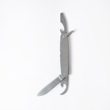 Stainless steel pocket knife with blade and hook tool, partially opened, textured handle