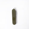 Olive drab folding pocket knife with textured handle and metal keyring lanyard