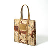 Tote bag with tan camo print, webbing handles, and front patch pocket