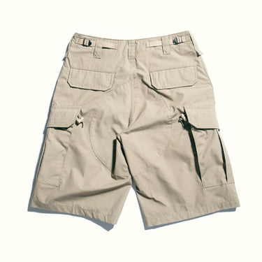 Khaki tactical cargo shorts with multiple flap pockets and belt loops
