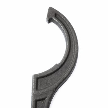 Castle nut wrench hooked jaw close-up, curved dark gray ends