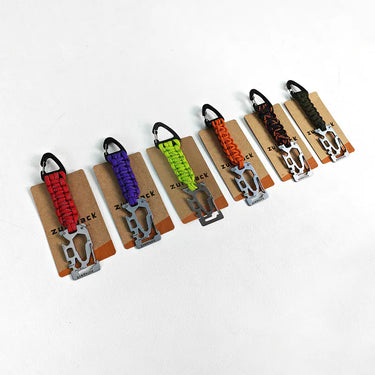 Multiple card tools on display with paracord lanyards in assorted colors