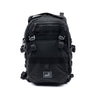 Black assault pack with front MOLLE panel, zip pocket, and shoulder straps