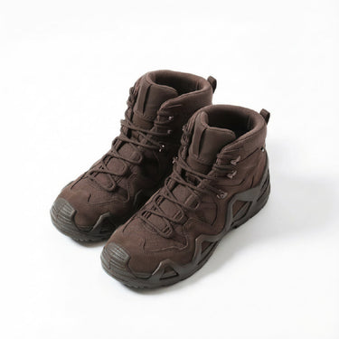 Brown mid tactical boots with lace-up front, padded ankle collar, and rugged rubber sole
