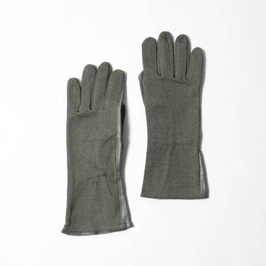 Cuffed flight gloves in foliage green, suede palm texture and stitched fingers
