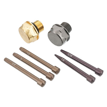 Accessory set with brass fitting, gray adapter, and multiple metal pin tools