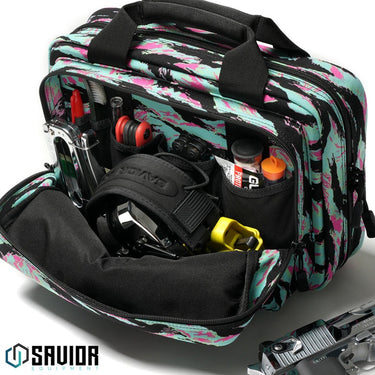 Open double pistol case with black organizer straps and multiple storage compartments.