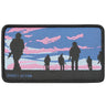 Rectangular patch with black border, blue-pink sunset, black silhouettes, 'DIRECT ACTION'