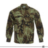 Woodland camo field shirt with long sleeves, button front, and flap chest pockets.