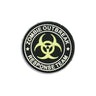 Round PVC patch, black with green biohazard symbol and text