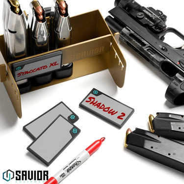 Magnetic ID patches in use, gray boards, black borders, teal marking icons