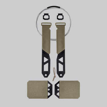 Tactical cutaway system with tan straps, black frame, and two rectangular attachment pads