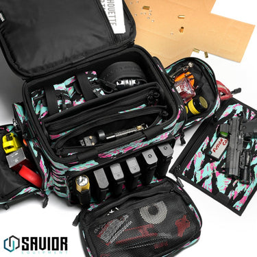 Open pistol range bag showing multiple padded slots, elastic organizers, and gear compartments