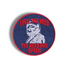 Embroidered round patch with red border, navy blue background, astronaut graphic and text