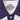 White polo collar close-up with navy globe emblem and white button