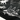 Black F-14 Tomcat towel close-up with white aircraft line art